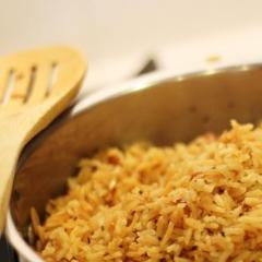 Pilaf with chicken in a pan